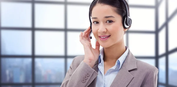 Good looking operator posing with a headset — Stock Photo, Image