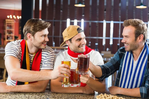 Men toasting with beers — Stock Photo, Image