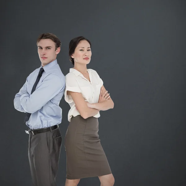 Business colleagues with arms crossed — Stock Photo, Image