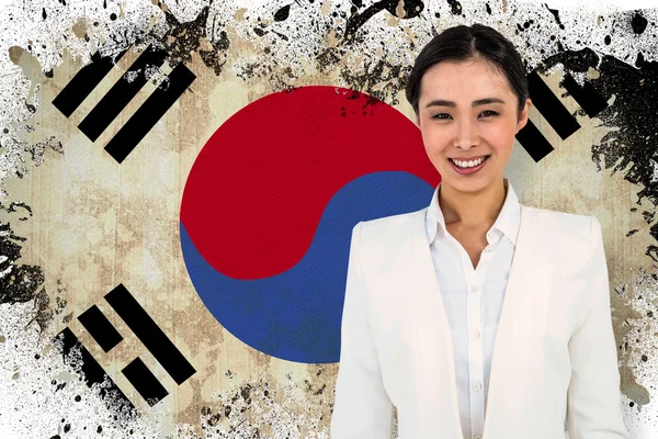 Sorridente empresária contra a bandeira da República da Coreia — Fotografia de Stock