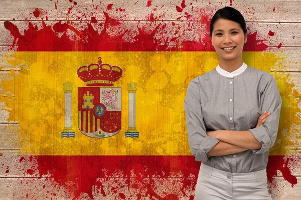 Mujer de negocios contra bandera de España — Foto de Stock