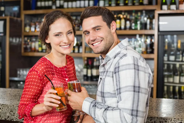 Couple toasting with beers — Stock Photo, Image