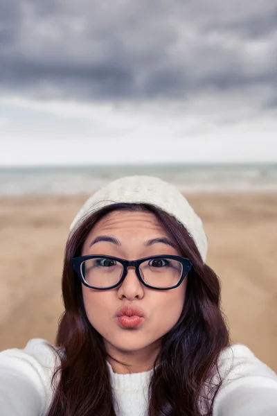Asian woman making faces — Stock Photo, Image