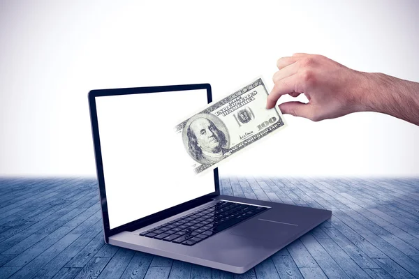 Composietbeeld van hand met dollar — Stockfoto