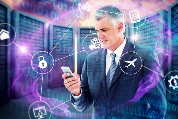 Composite image of businessman using his smartphone — Stock Photo, Image