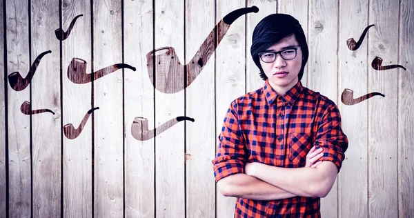 Serious hipster with crossed arms — Stock Photo, Image