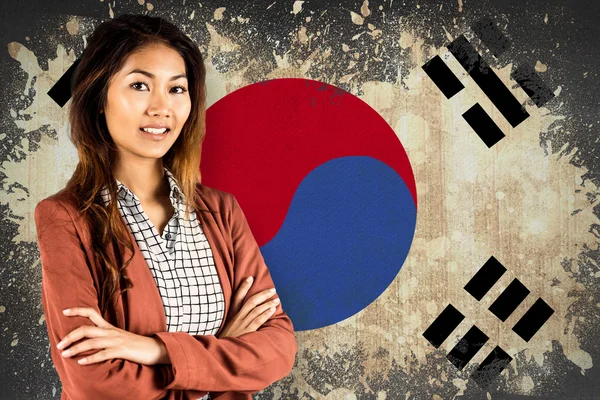 Предпринимательница против флага Республики Корея — стоковое фото