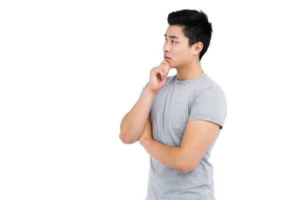 Man thinking with hand on chin — Stock Photo, Image