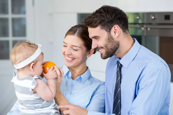 Couple with daughter at home — Stock Photo, Image
