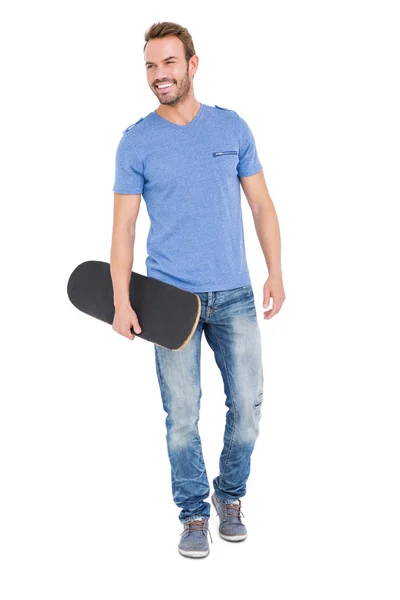 Uomo con skateboard — Foto Stock