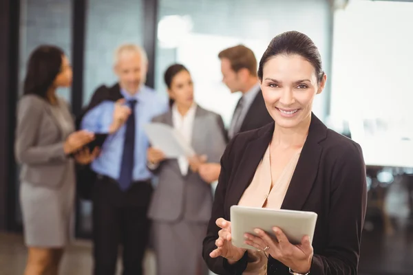 Businesswoman using digital tablet — Stock Photo, Image