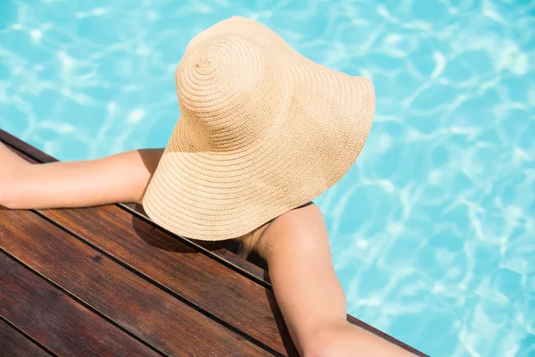 Woman wearing straw hat — Stock Photo, Image