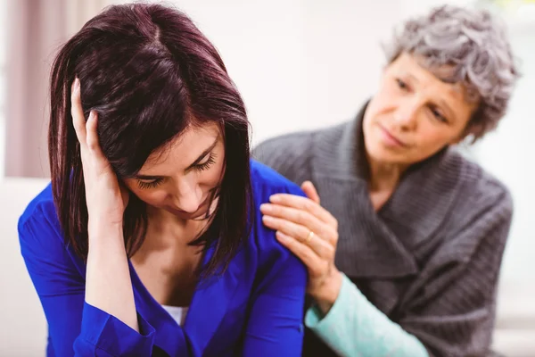 Mother comforting sad daughter — Stock Photo, Image