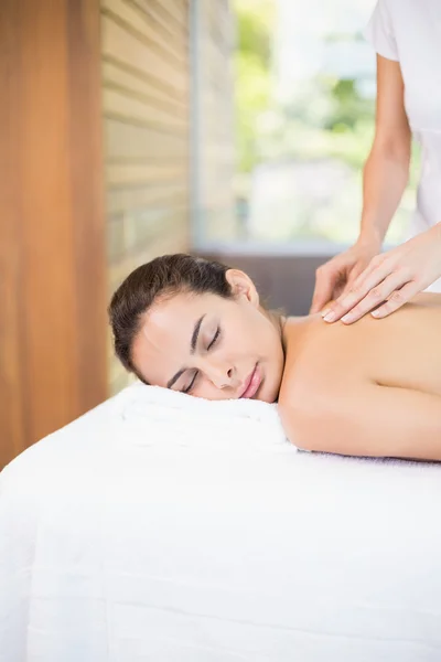 Woman receiving massage Royalty Free Stock Photos