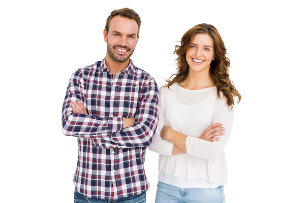 Couple standing with arms crossed — Stock Photo, Image