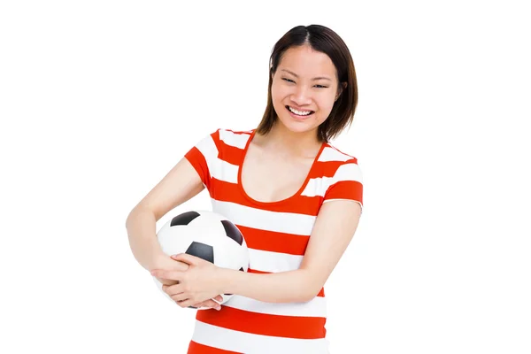 Junge Frau mit Fußball — Stockfoto