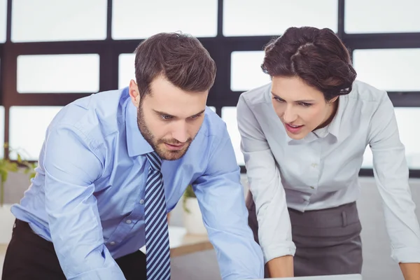 Concentrated young business people — Stock Photo, Image