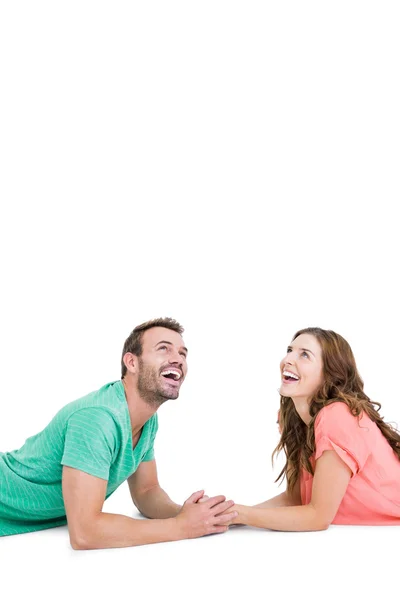 Pareja acostada en el suelo mirando hacia arriba —  Fotos de Stock