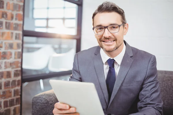 Businessman holding digital tablet — Stock Photo, Image