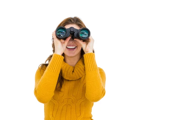 Mujer mirando a través de prismáticos —  Fotos de Stock