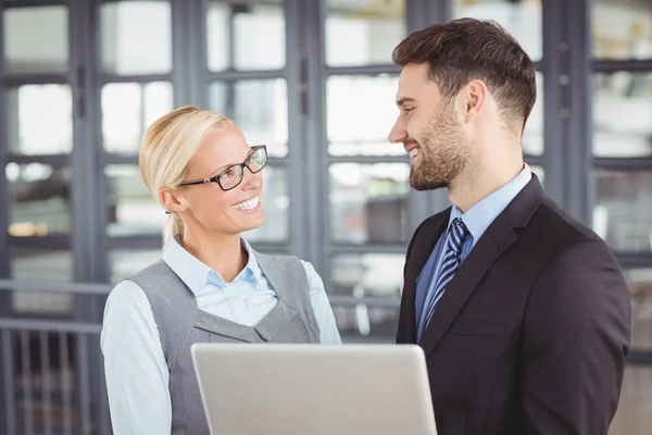 Business people looking face to face — Stock Photo, Image