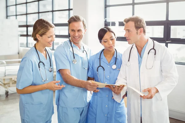 Medical team interacting with each other — Stock Photo, Image