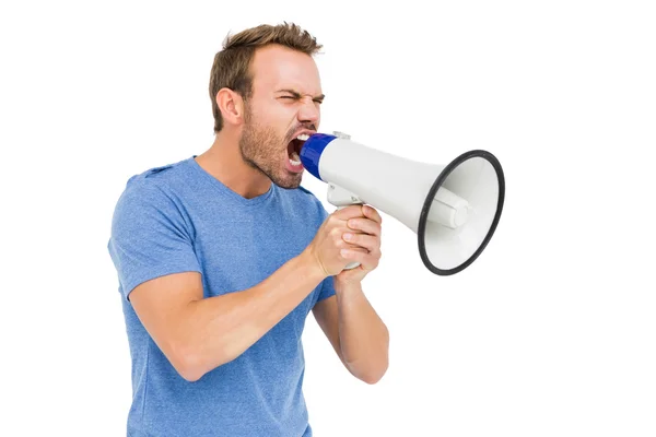 Man shouting on horn loudspeaker — Stock Photo, Image