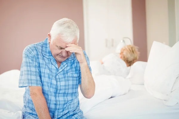 Tensed senior couple at home — Stock Photo, Image