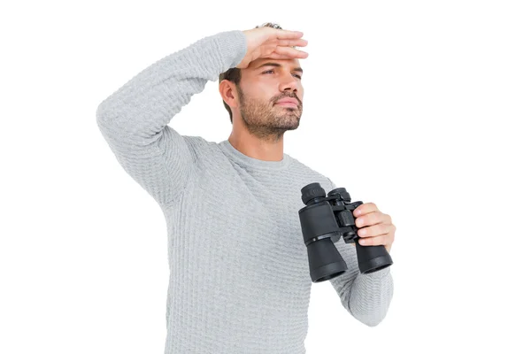 Young man with binocular — Stock Photo, Image