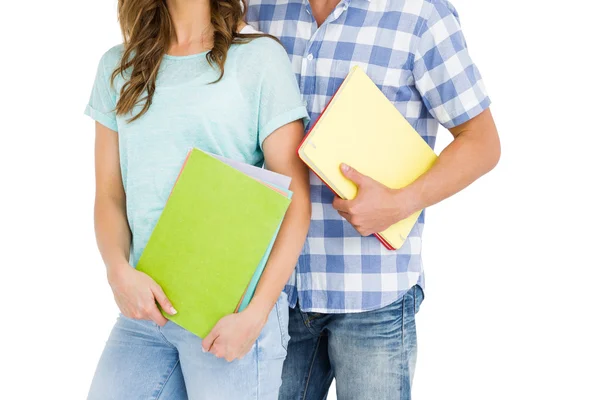 Couple holding book and folder — Stock Photo, Image