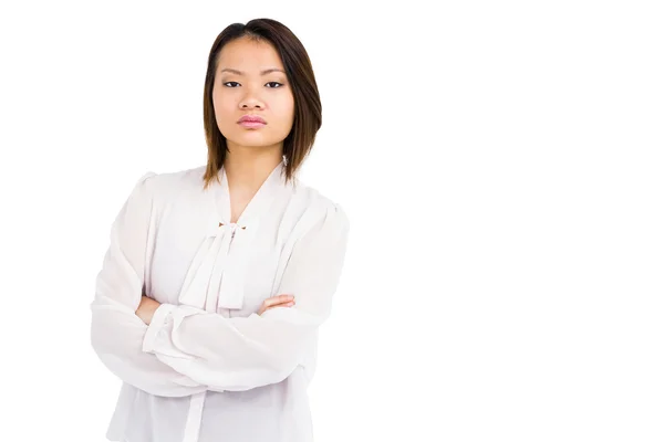Angry woman standing with arms crossed — Stock Photo, Image