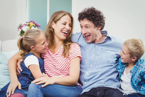 Cheerful couple with children — Stock Photo, Image