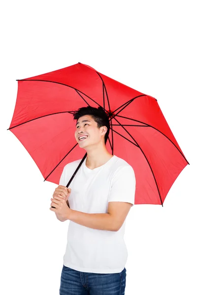 Homem segurando guarda-chuva — Fotografia de Stock