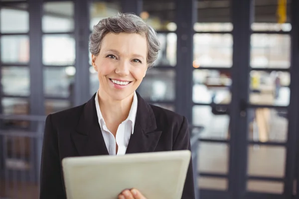 Businesswoman using digital tablet — Stock Photo, Image