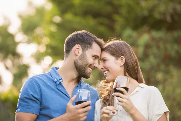 Happy couple with wineglass — Stock Photo, Image