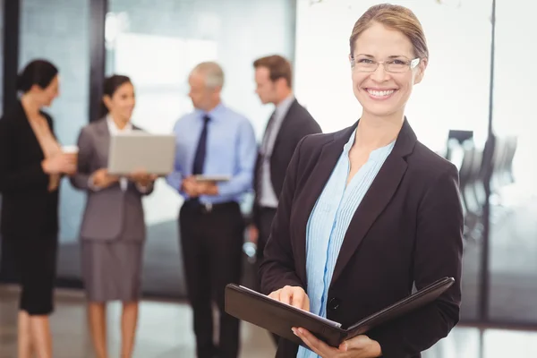 Happy businesswoman with file — Stock Photo, Image