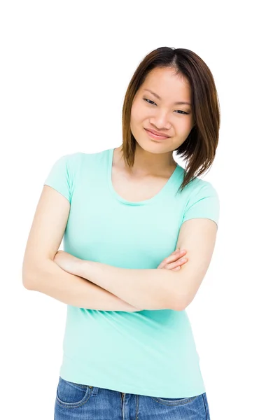 Woman standing with arms crossed — Stock Photo, Image