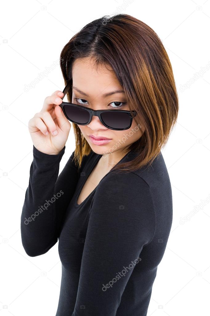 Woman Looking Over Sunglasses Stock Photo Image By C Wavebreakmedia Woman Looking Over Sunglasses Stock Photo Image By C Wavebreakmedia