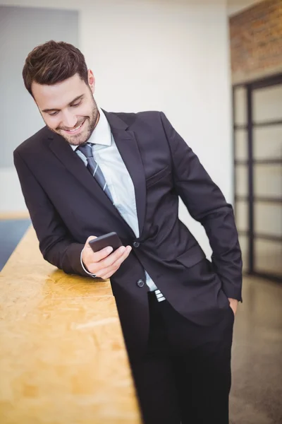 Businessman looking in cellphone — Stock Photo, Image