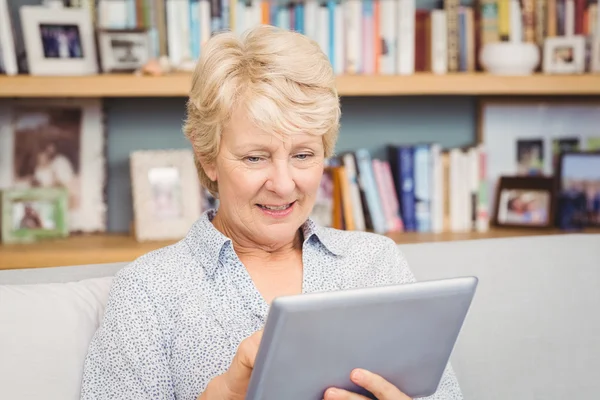 Woman using digital tablet at home — Stock Photo, Image
