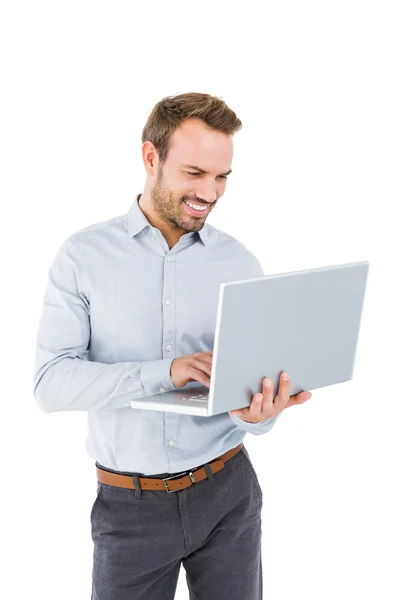 Young man using laptop — Stock Photo, Image