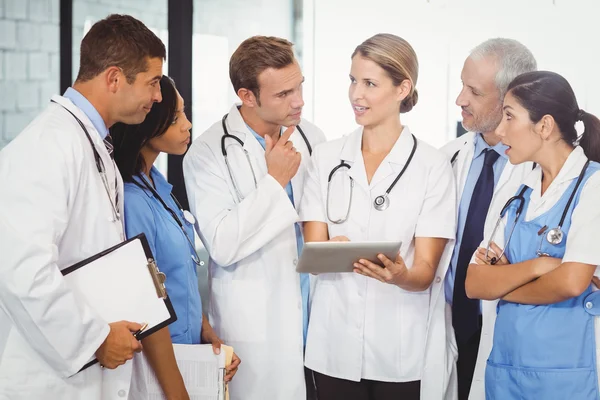 Medical team interacting with each other — Stock Photo, Image