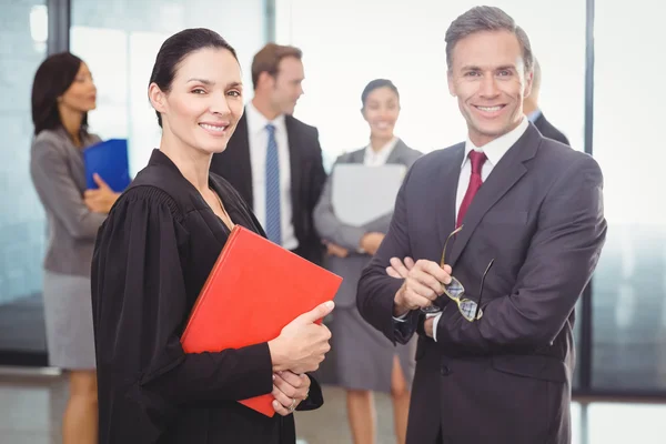 Businessman standing with lawyer — Stock Photo, Image