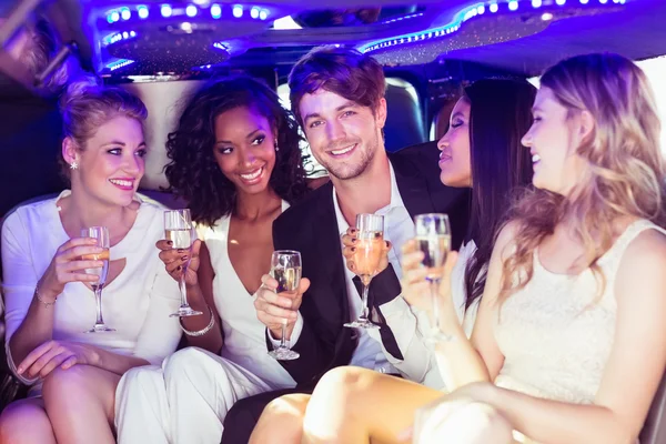 Happy friends drinking champagne — Stock Photo, Image