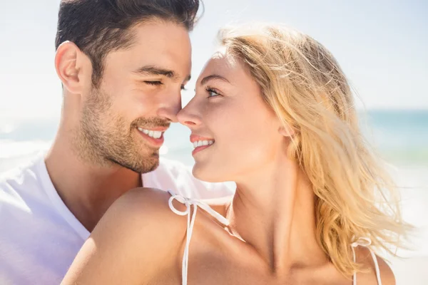 Smiling young couple hugging — Stock Photo, Image