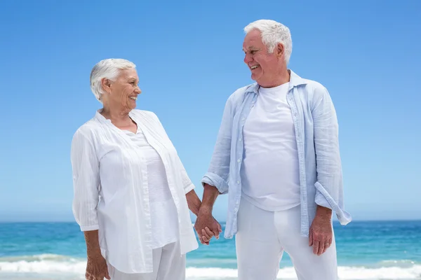 Senior couple holding hands — Stock Photo, Image