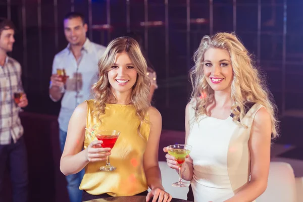 Pretty girls with cocktails — Stock Photo, Image