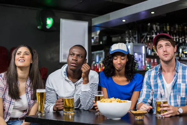 Friends disappointing by the match — Stock Photo, Image