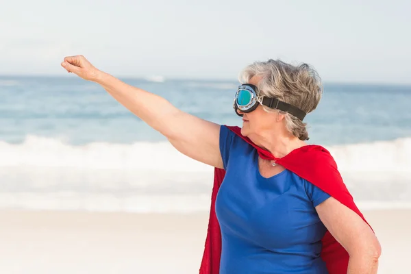 Senior woman wearing superwoman custome — Stock Photo, Image