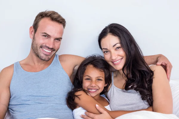 Happy family in their bedroom — Stock Photo, Image